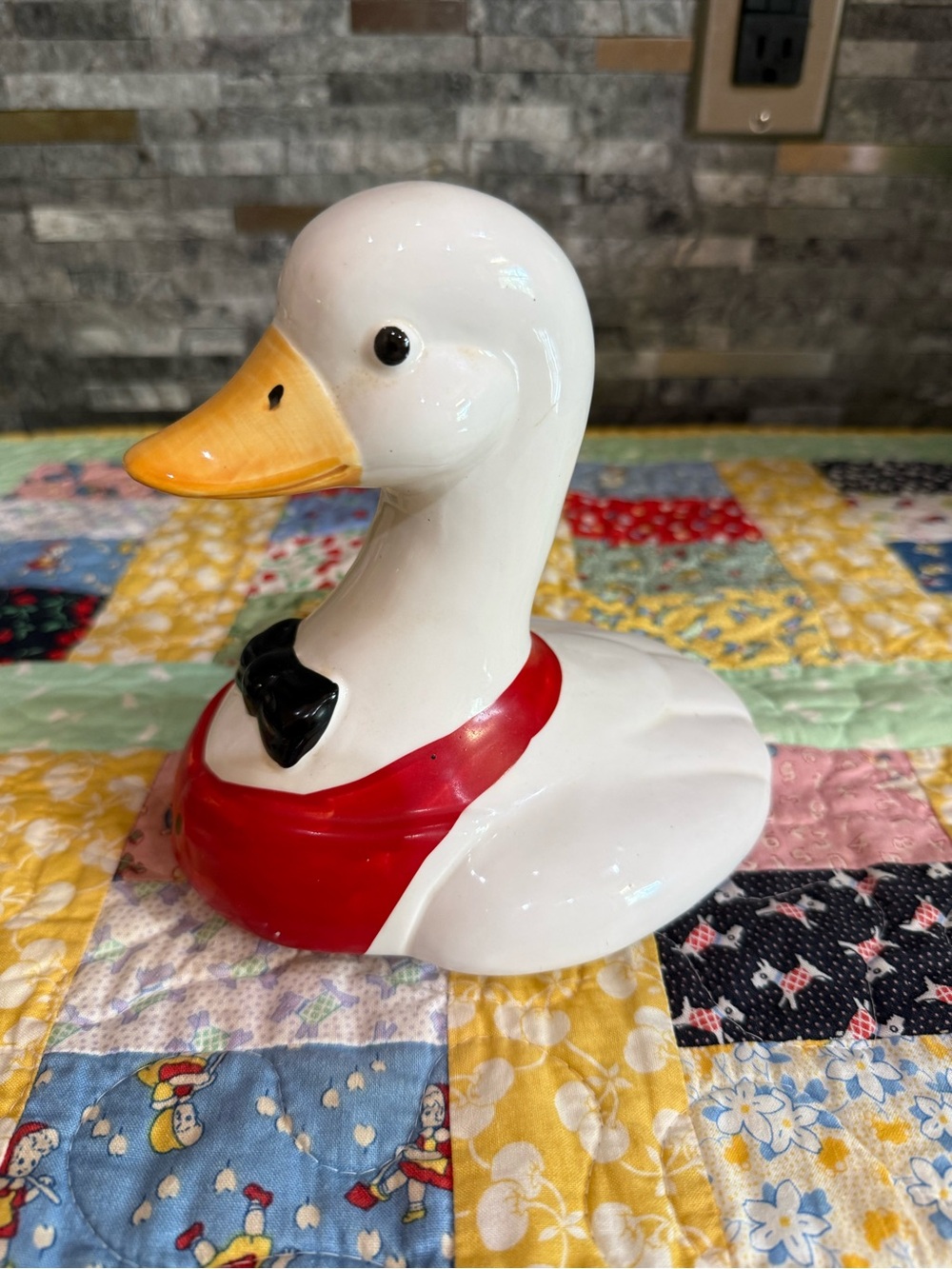 White Ceramic Duck Figurine with Red Scarf and Black Bow